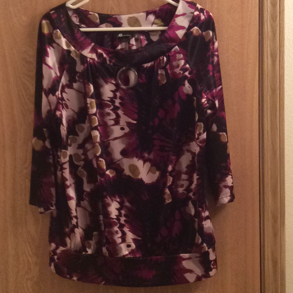 Top with elbow sleeved and banded bottom.